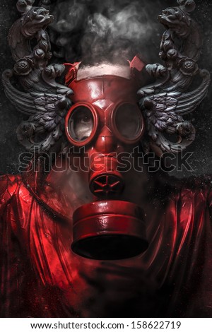 Nuclear attack. A man in a gas mask in the smoke. artistic background