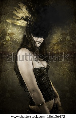 Sensual woman with black smoke in her eyes