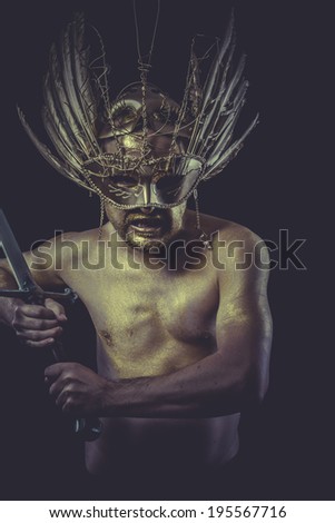 Hero, golden deity, man with wings and gold helmet