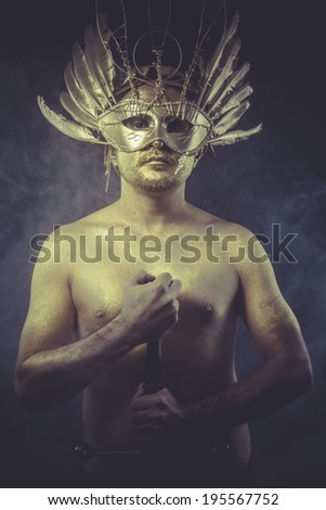 Warrior, golden deity, man with wings and gold helmet