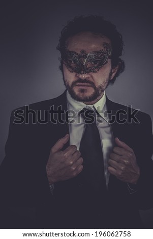 Posing, Portrait of elegant businessman, mysterious venetian mask
