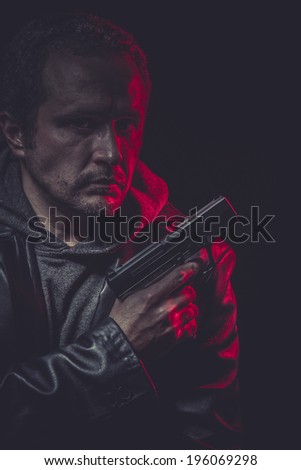 Murder, secret agent with gun and red light