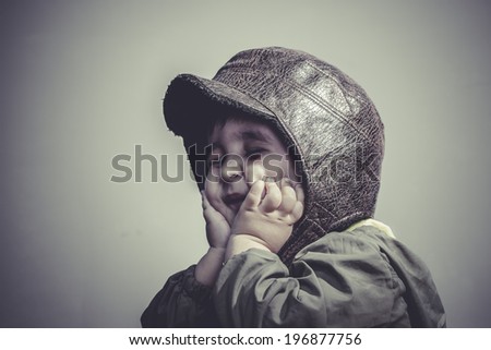 game, fun and funny child dressed in aviator hat and goggles