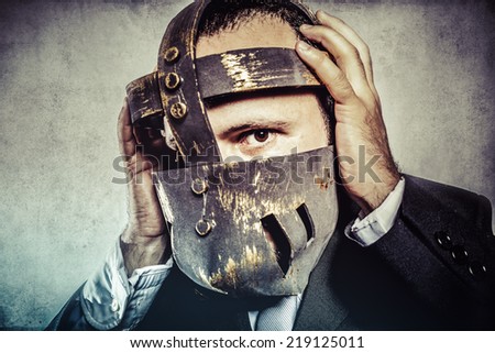 frustrated, dangerous business man with iron mask and expressions