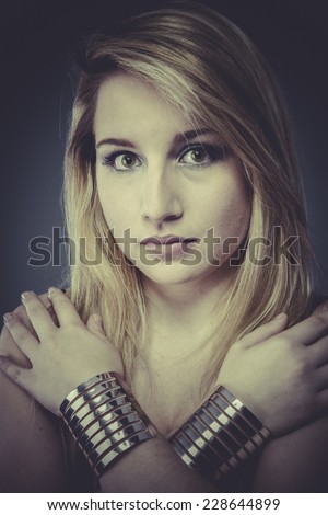 Gold, Beautiful blonde with silver jewelry and mask