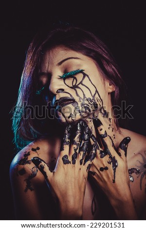 depressed concept, crying woman with tears and makeup dark light