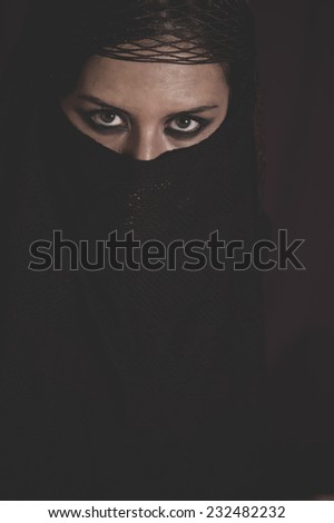 India, woman in traditional Islamic veil, burka, beautiful and deep look
