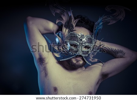 Treasure, jewels and silver. Man with mask of precious metals