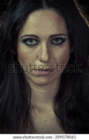 Divorce, sad brunette woman with long hair and evening gown