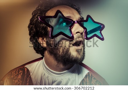 Funny, Man with glasses and stupid face huge stars, selfie