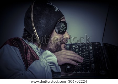 Illegal, computer security, hacker pirate dress with hat and skull