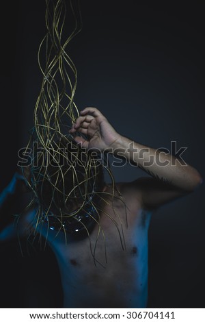 emotional, depression and anxiety, naked man with a crown of thorns on his head