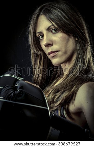 Female Athlete with boxing gloves