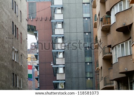 Urban scenery of windows on a facade walls of tenement houses