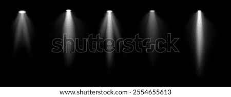 White spotlight set. Multiple focused beams, ceiling-mounted lighting, bright white glow, stage illumination, modern lighting design, minimalistic decor, professional setup