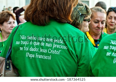 ROME - SEPTEMBER 21: unidentified pilgrim wear t-shirt with Pope Francis quote on September 21, 2013 in Rome, Italy. I don\'t have silver or gold but bring with me the most precious gift, Jesus Christ!