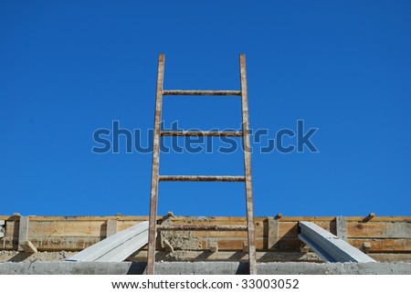 photo of a ladder to get to roof house under construction
