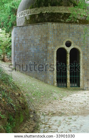 detail of a old islamic house inside of the jungle