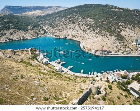 Similar – Image, Stock Photo Small coastal village with cottages in bay near snowy mountains