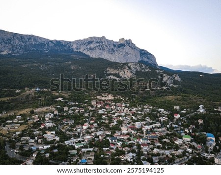 Similar – Image, Stock Photo Small coastal village with cottages in bay near snowy mountains