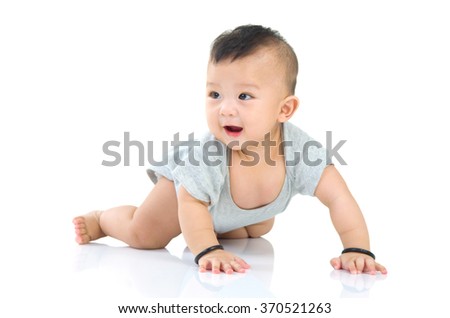 Similar – Image, Stock Photo Curious beautiful baby boy in blue body lying on playing mat, looking in the camera