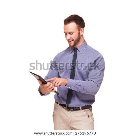 Young handsome smiling man with tablet computer isolated on white background