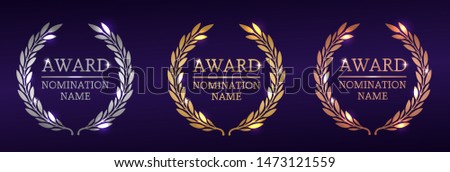 laurel wreaths various awards. Gold, silver and bronze awards. vector illustration with shine and glitter on a purple background