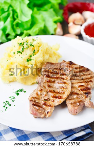 Grilled pork with mashed potato
