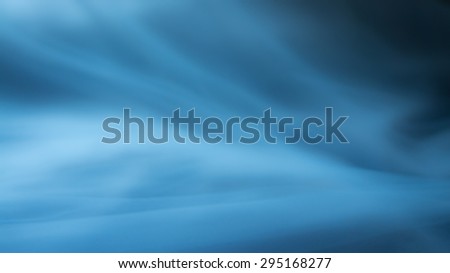wavy fabric or blue background abstract cloth or liquid waves illustration of wavy folds of silk texture satin or wallpaper design of elegant curves material or defocused wavy background