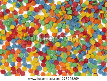 Bright colored background of the  sugar circles on a white