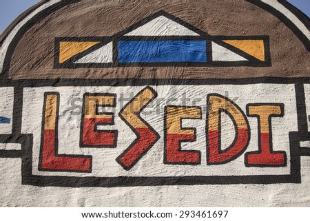 South Africa, Gauteng, Lesedi Cultural Village (unique center, cradle of living African culture) - 04 July, 2015. Colorful sign Lesedi. Main entrance.