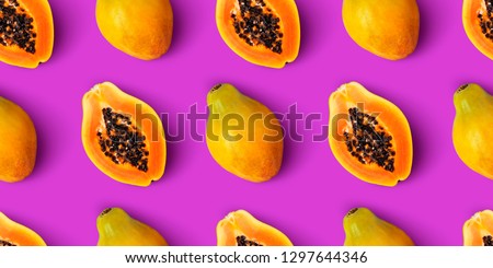 Papaya fruit seamless pattern on purple background, flat lay, top view 商業照片 © 