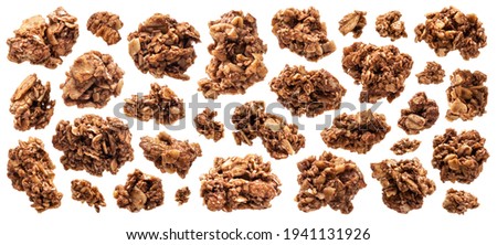 Chocolate granola, crunchy muesli isolated on white background with clipping path, macro collection