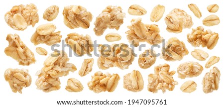 Oat granola, crunchy muesli isolated on white background with clipping path, macro
