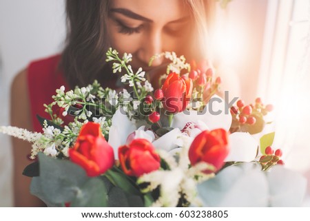 Similar – Image, Stock Photo Woman smells red tulips