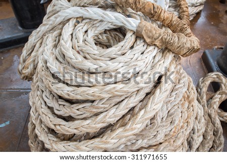 Ship ropes heap. Pile of various ropes and strings