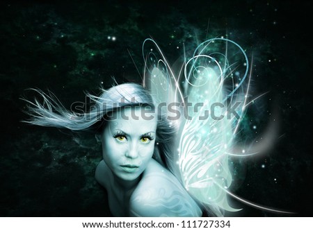 fairy woman with butterfly wings over dark background