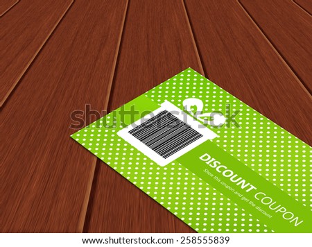 spring discount coupon lying on wooden table