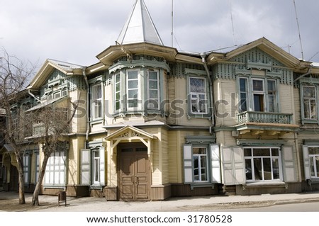 Russia. City centre of Irkutsk. The ancient wooden house constructed in the beginning of XX century. The monument of architecture protected by the state.