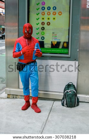 NEW YORK - CIRCA 2014: Men dressed as a Spider-man costume on the street in New York.