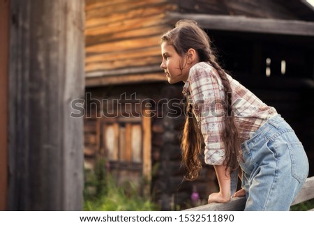 Similar – Image, Stock Photo Girls climb a fence in the spring in the garden.The concept of childhood, cheerfulness, carefree.