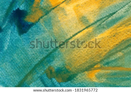 Blue and yellow abstract watercolor background. Multicolor watercolour gradient with green tint, hand painted grain texture. The color splashing on paper. Modern expressionist painting. 