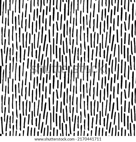 Thin vertical dashes vector seamless pattern. Black linear ornament. Memphis style background with small pen stripes. Retro black and white texture. Hand drawn regular doodle simple lines. 