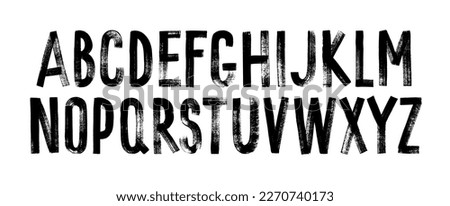 Grunge alphabet with capital letters. Dirty textured vector font. Typographic distressed font with dry brush strokes. Hand drawn characters with a rough inked texture. Uppercase letters.