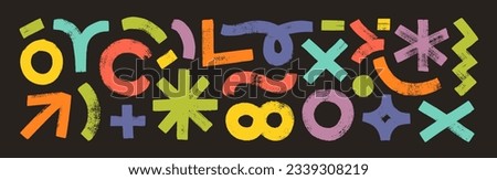 Creative hand drawn various shapes and doodle objects in grunge style. Bold brush drawn colorful circles, asterisk, infinity sign, x, arrow, wavy and squiggle lines. Naive playful vector shapes.