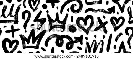 Brush drawn doodle shapes seamless pattern. Hearts, crowns, arrows, crosses, swirls and dots with dry brush texture. Banner background with trendy graffiti style elements. Hand drawn various shapes.