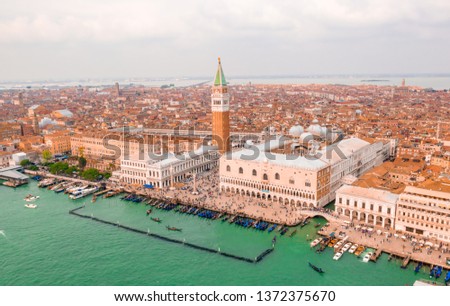 Similar – Image, Stock Photo Gondolas sailing along canal between city buildings