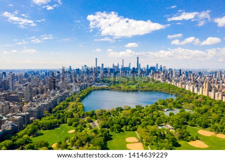 Aerial view of the Central park in New York with golf fields and tall skyscrapers surrounding the park. Сток-фото © 