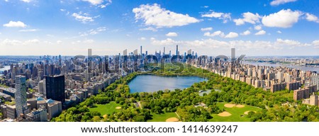 Aerial view of the Central park in New York with golf fields and tall skyscrapers surrounding the park. Сток-фото © 