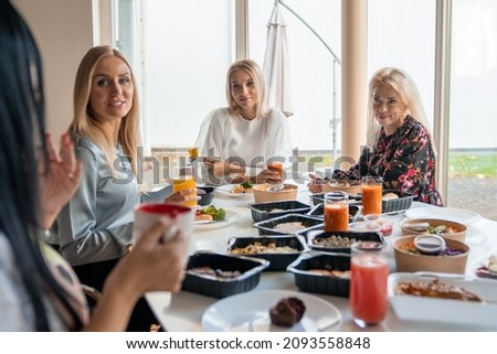 Similar – Image, Stock Photo Cheerful woman having healthy breakfast at home